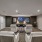 theatre room with seating and carpeting