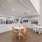 lounge with seating tables and kitchen
