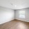 bedroom with hardwood floors and a window