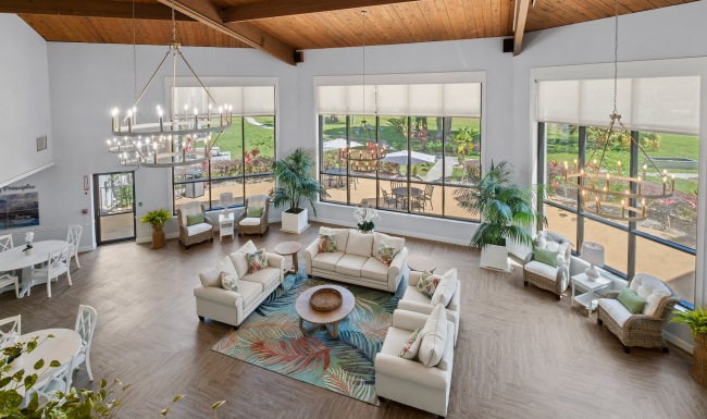 Access to resident-only features large lounge with seating tables and windows