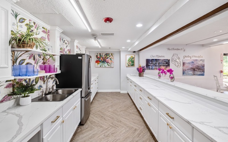Refined spaces to match your style resident kitchen area with overhead lighting