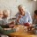 a group of people sitting around a table